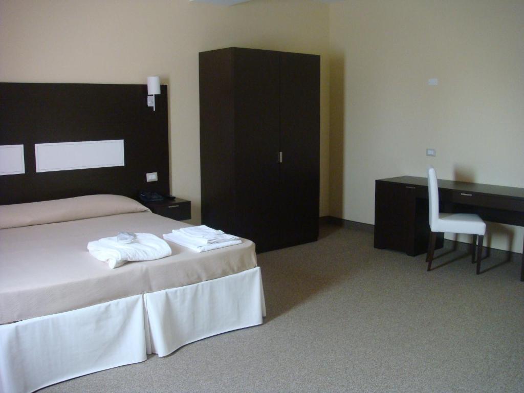 Santa Loja Hotel Residence Tito Phòng bức ảnh